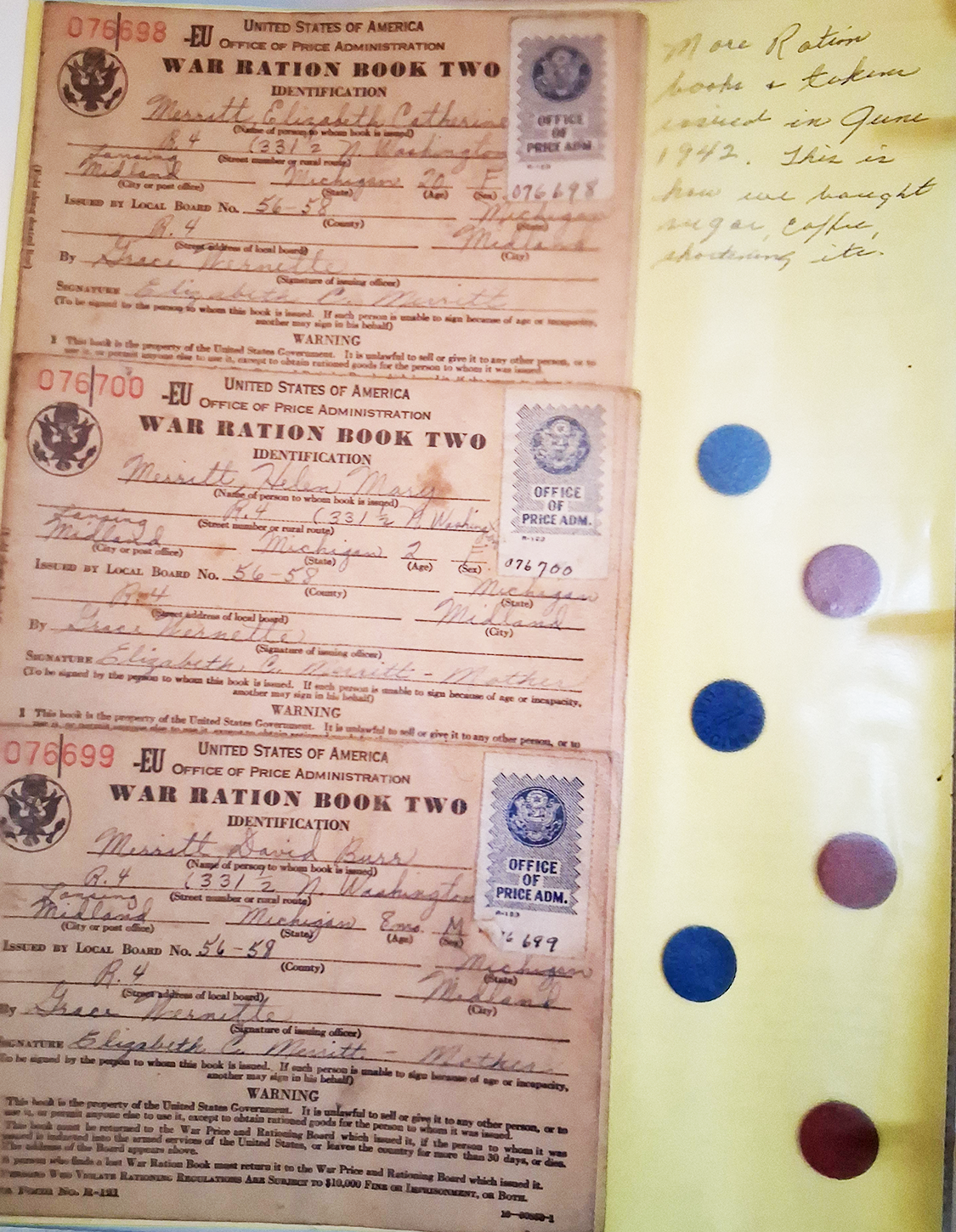 war rations - Liz saved these war ration coupons from WW2 because she thought someone might like to look at them. The dots on the side were to take to the gas station to get gas. 